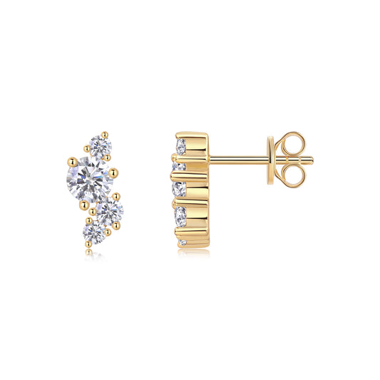 Gold earrings with diamond-like stones on a white background